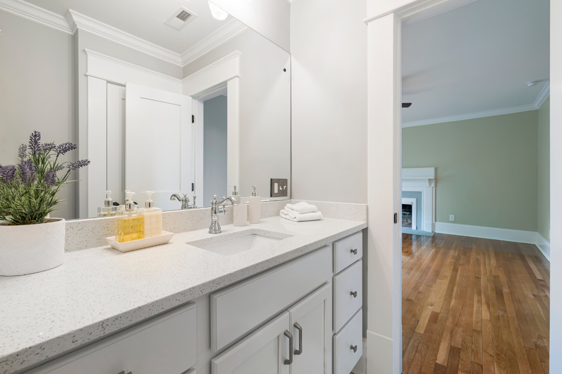 bathroom in empty house ready to move in and have professional organizers unpack