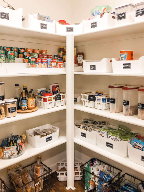 White organized and labeled pantry.