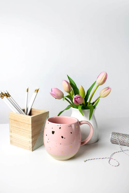 Blush pink mug on white decluttered desk. Portsmouth, NH professional organizing