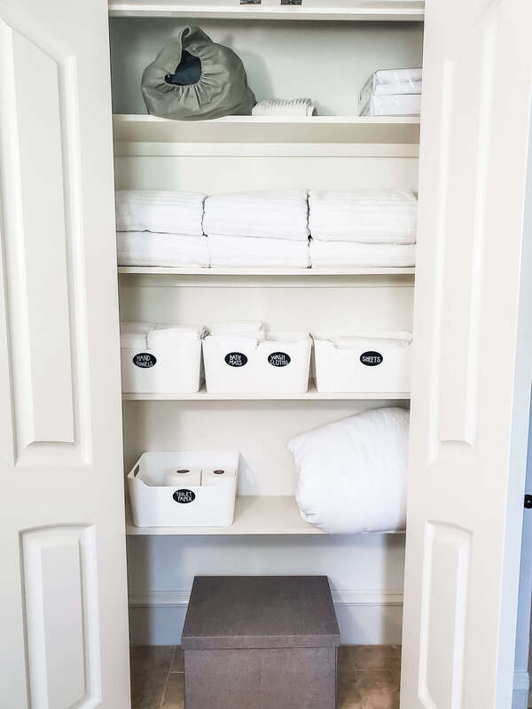 white simple linen closet cary nc
